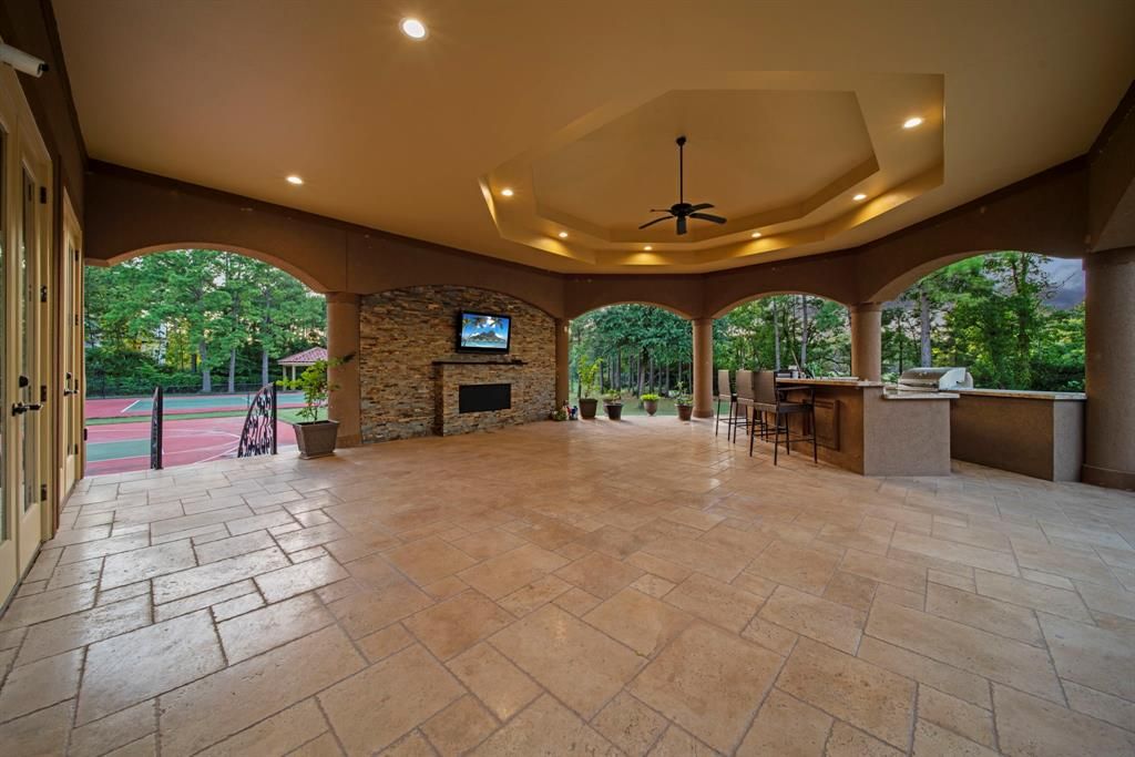 Secluded splendor in tomball grand masterpiece on a lakefront corner lot for 3. 395 million 42 1