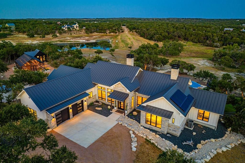 Serene lake views and luxury living await in wimberleys exclusive property priced at 3. 995 million 2