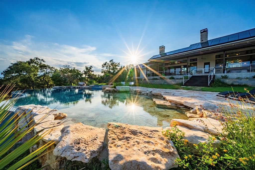 Serene lake views and luxury living await in wimberleys exclusive property priced at 3. 995 million 4