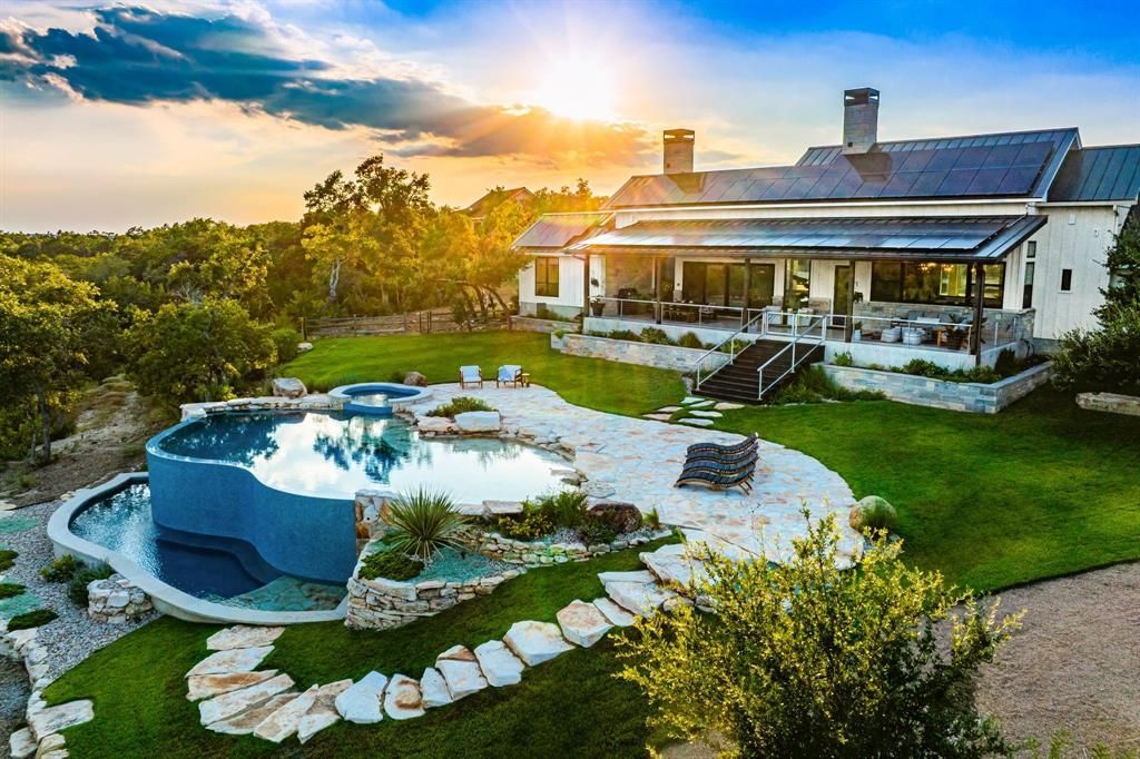 Serene lake views and luxury living await in wimberleys exclusive property priced at 3. 995 million 5