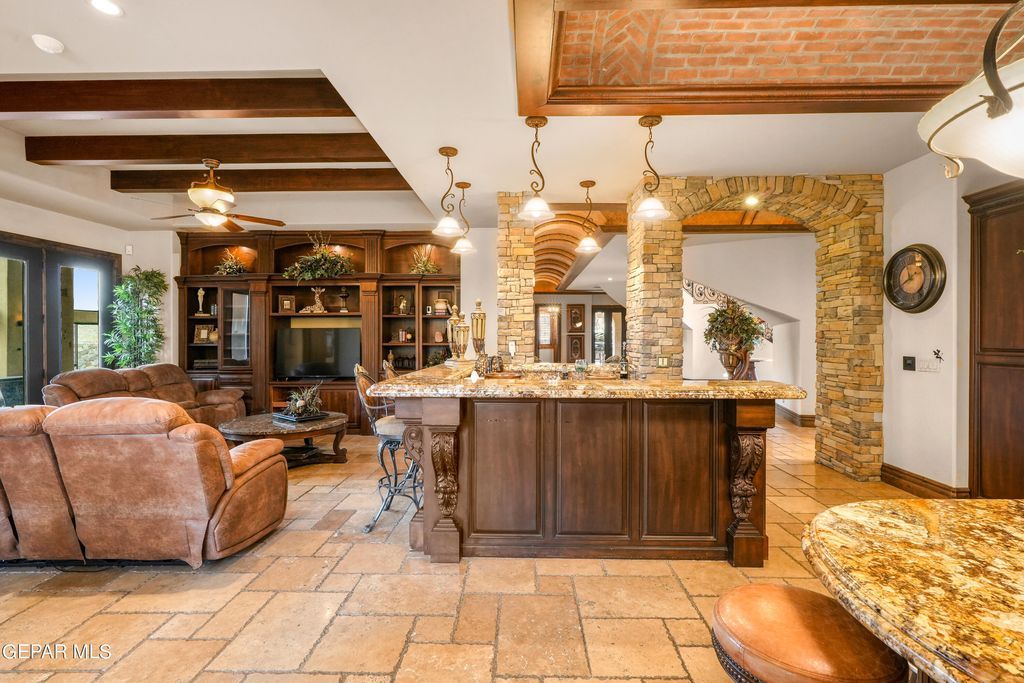 Tuscan elegance luxury and sophistication define this custom built 2. 5 million home in el paso 37