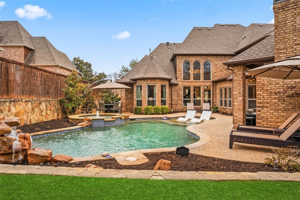 Exquisite custom masterpiece in trophy clubs premier gated community asks for 1. 8 million 39