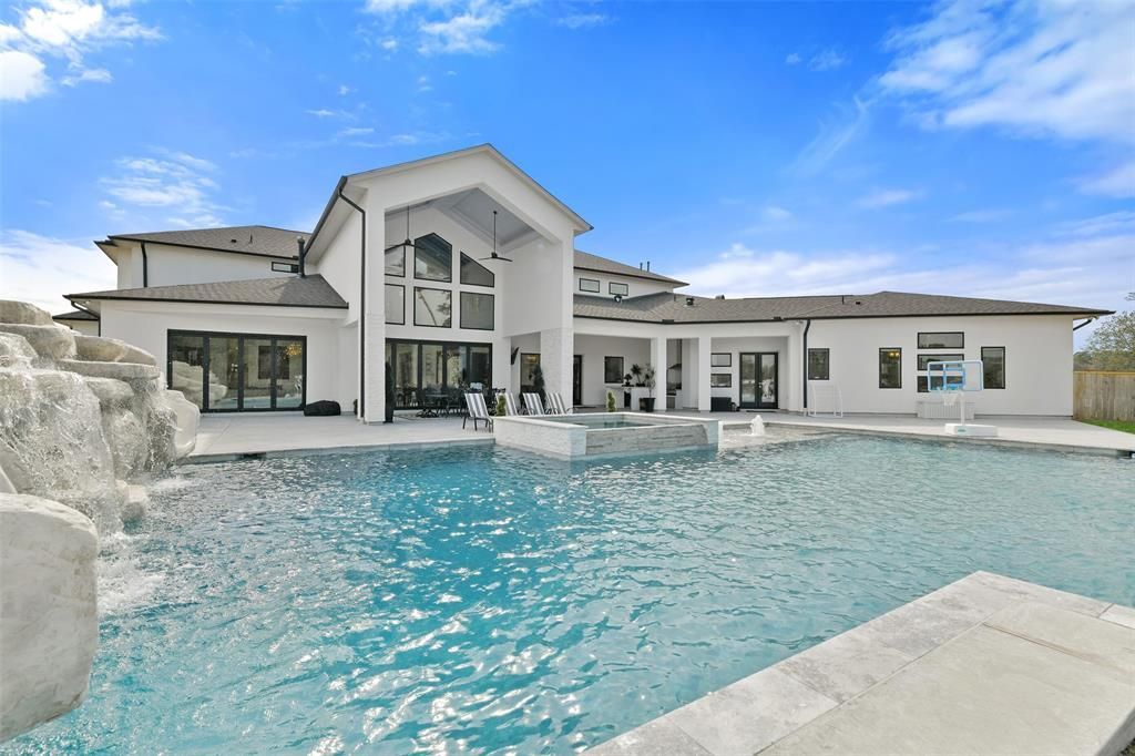 Luxurious lakeside living exquisite modern home in kings lakes estates offered at 2. 1 million 44