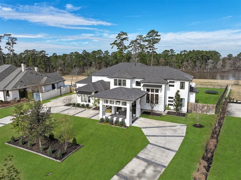 Luxurious Lakeside Living: Exquisite Modern Home in Kings Lakes Estates Offered at $2.1 Million
