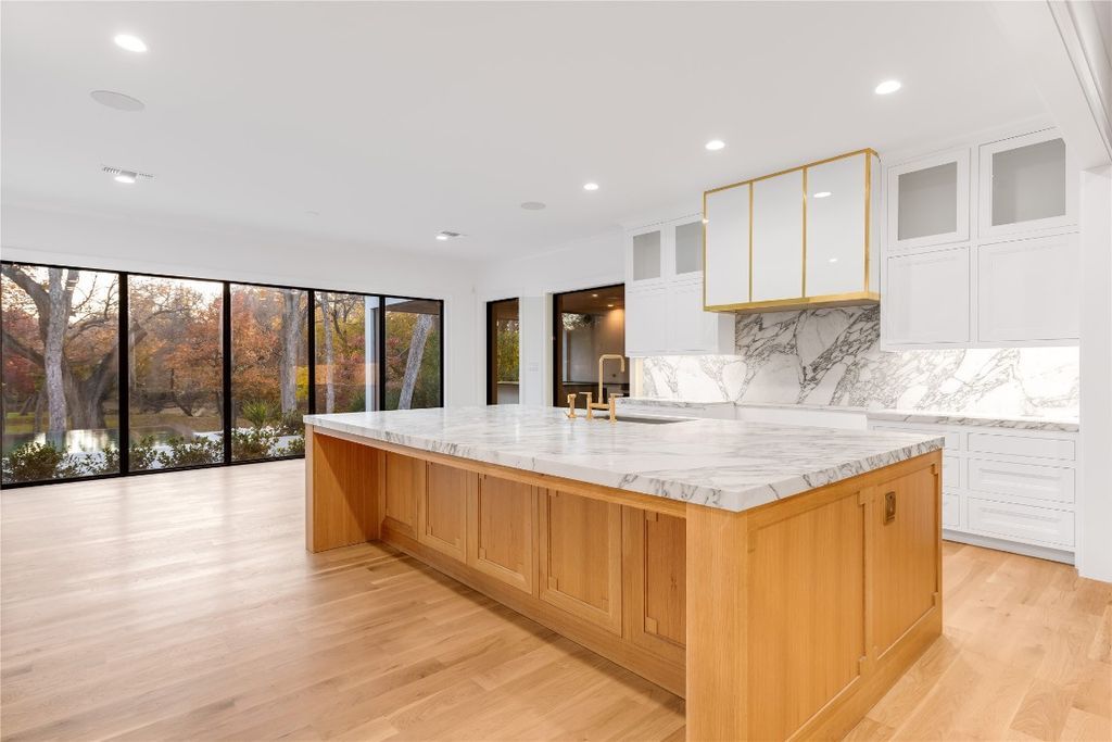 Modern sanctuary with creek views and luxurious amenities listed at 9. 995 million 18