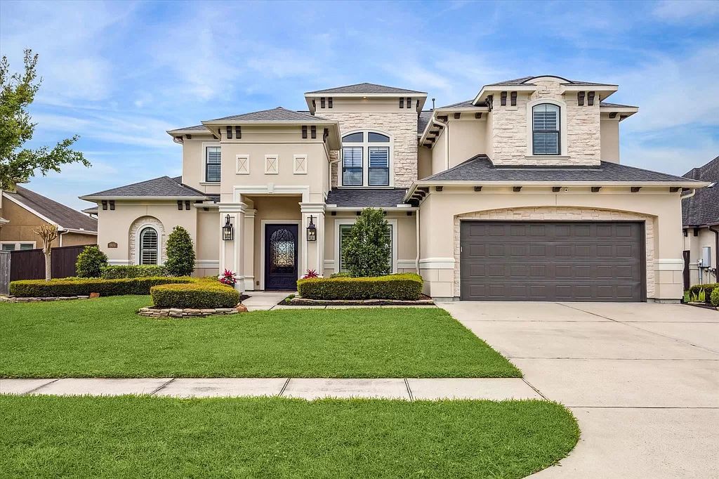 Sterling Creek Masterpiece! 5 Bedroom Custom Home in Friendswood with Pool & Oasis asks for $1,125,000