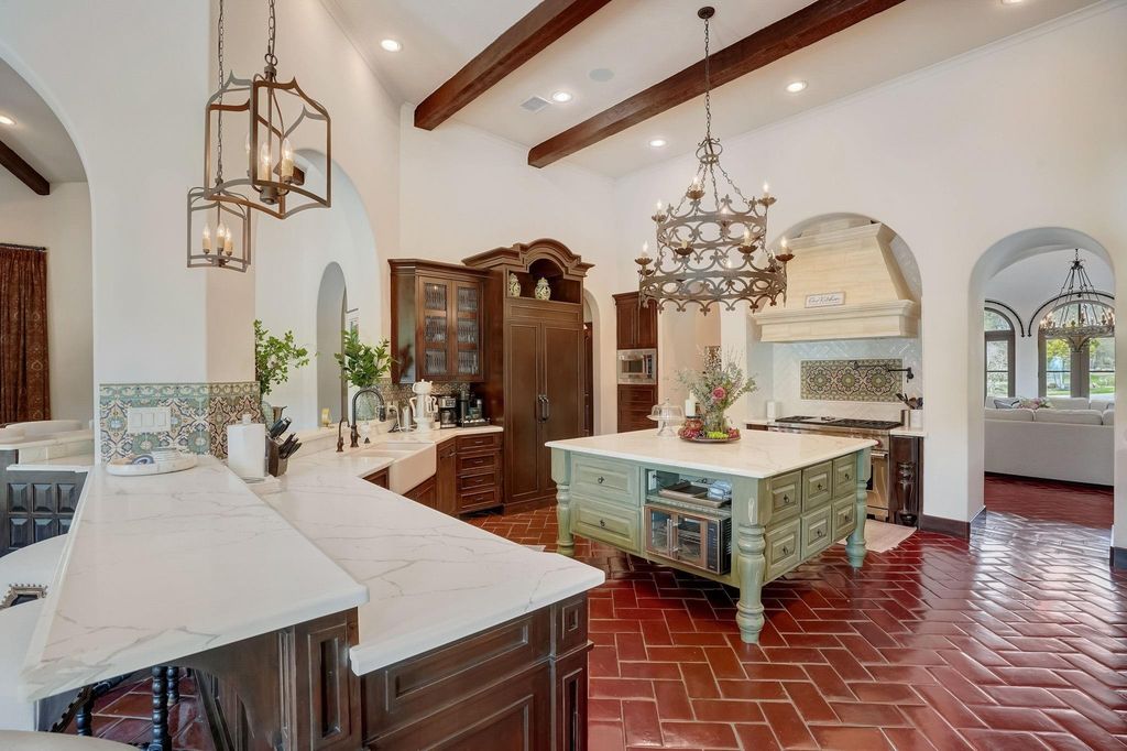 Spanish colonial home with private gate entry by elby martin hits market for 8. 5 million 12