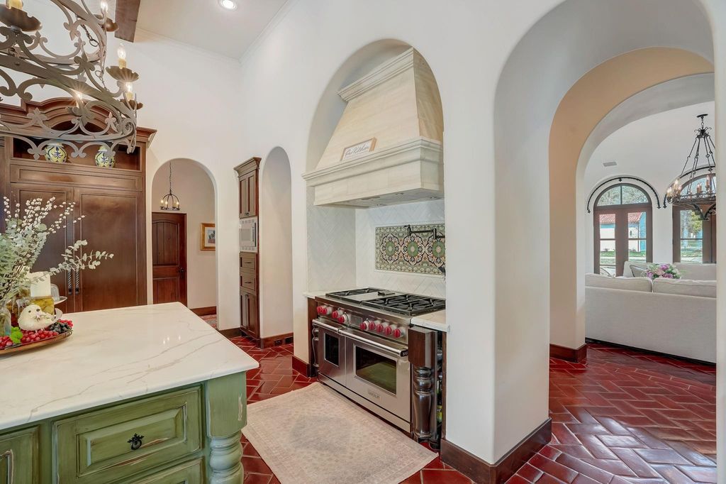 Spanish colonial home with private gate entry by elby martin hits market for 8. 5 million 13
