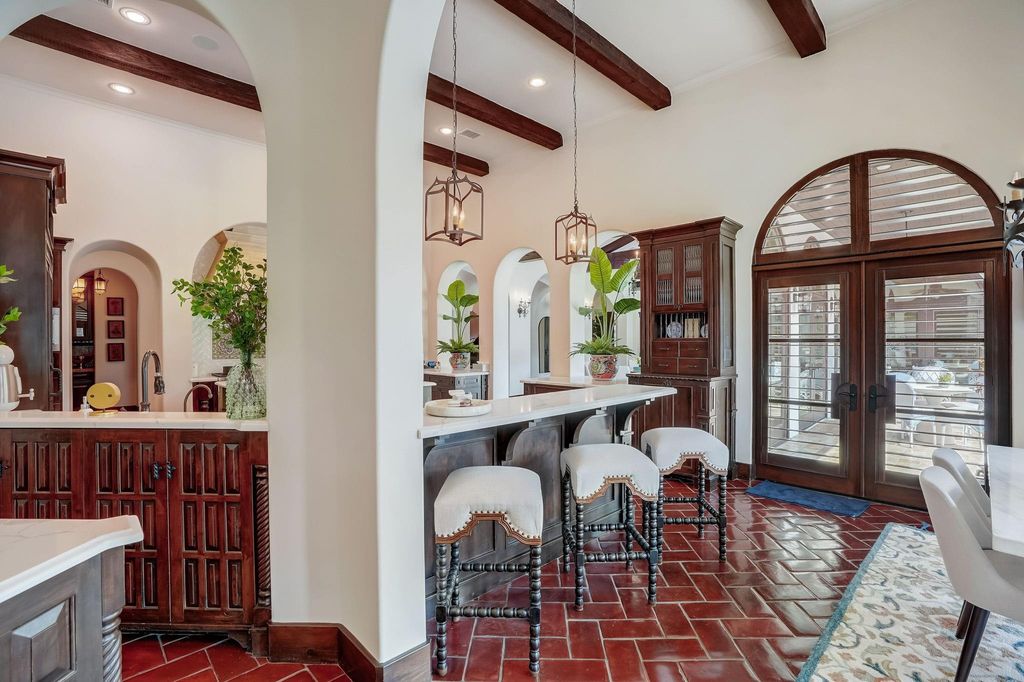 Spanish colonial home with private gate entry by elby martin hits market for 8. 5 million 15
