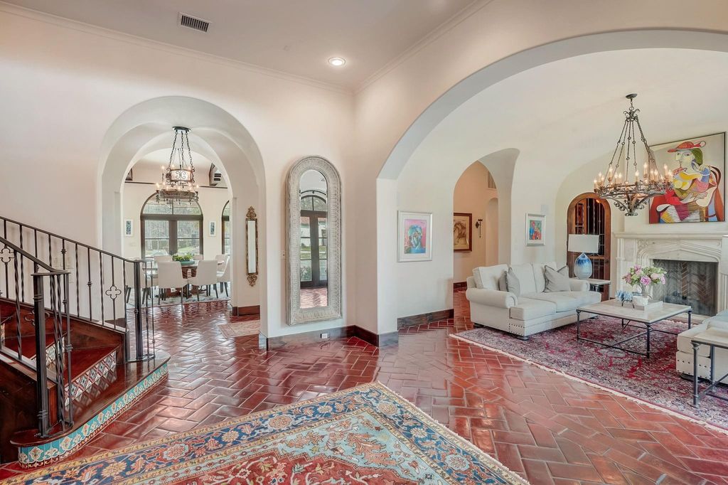 Spanish colonial home with private gate entry by elby martin hits market for 8. 5 million 17