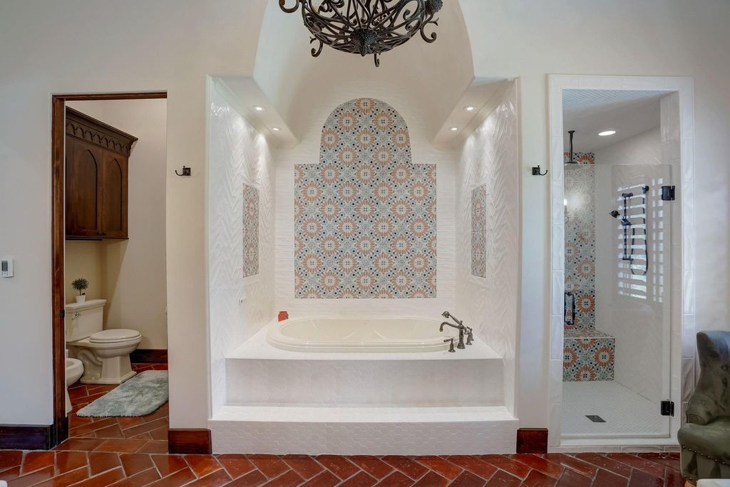 Spanish colonial home with private gate entry by elby martin hits market for 8. 5 million 18