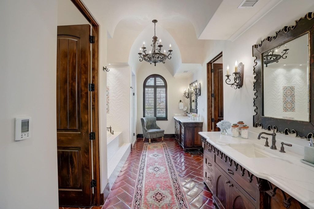 Spanish colonial home with private gate entry by elby martin hits market for 8. 5 million 20