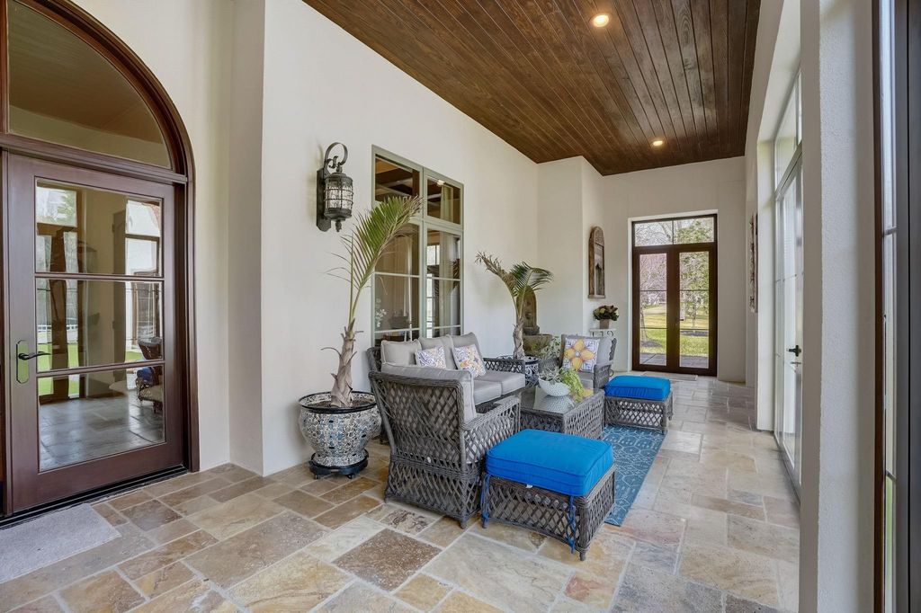 Spanish colonial home with private gate entry by elby martin hits market for 8. 5 million 21
