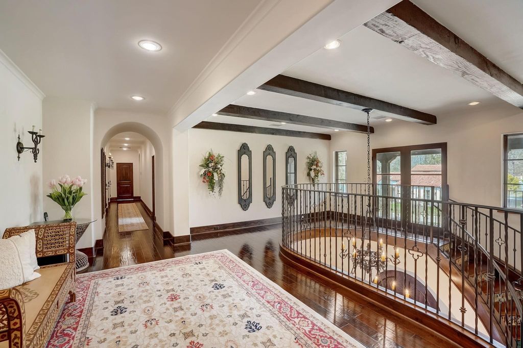 Spanish colonial home with private gate entry by elby martin hits market for 8. 5 million 23