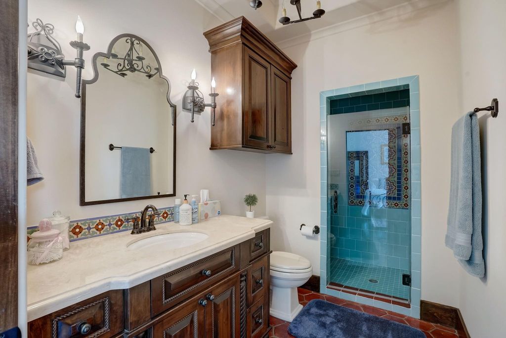 Spanish colonial home with private gate entry by elby martin hits market for 8. 5 million 26