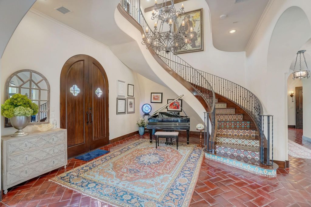 Spanish colonial home with private gate entry by elby martin hits market for 8. 5 million 3