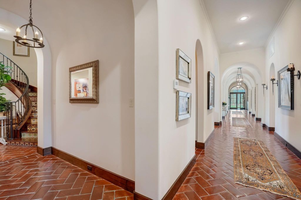 Spanish colonial home with private gate entry by elby martin hits market for 8. 5 million 7