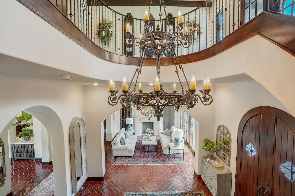Spanish colonial home with private gate entry by elby martin hits market for 8. 5 million 8