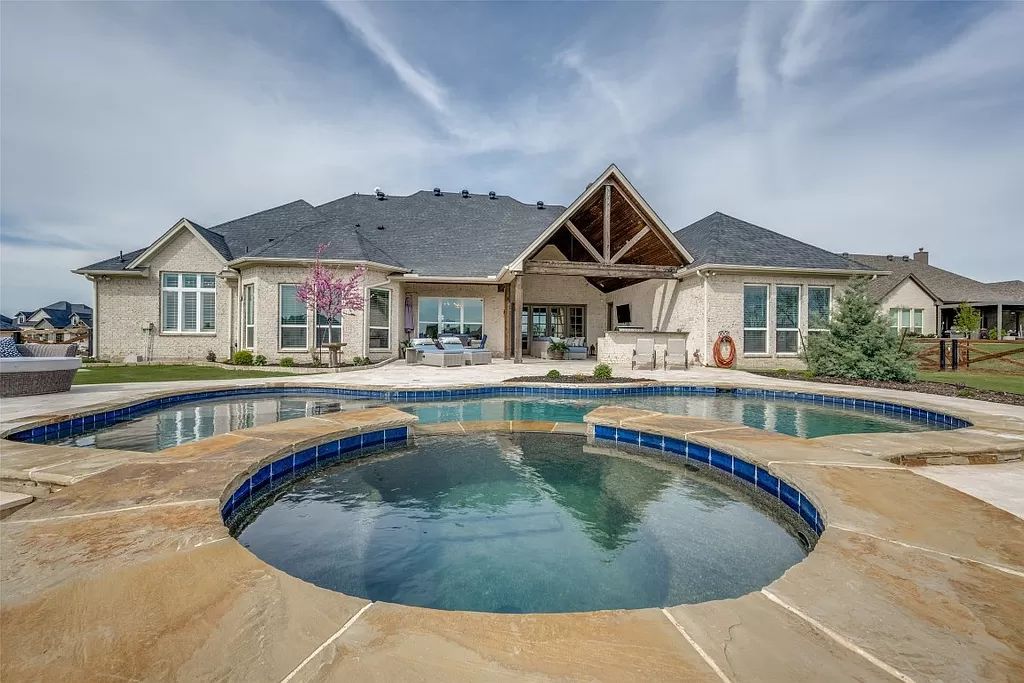 Stardust Ranch Gem! Luxurious Custom Home with Pool & Outdoor Oasis listed at $1,229,000