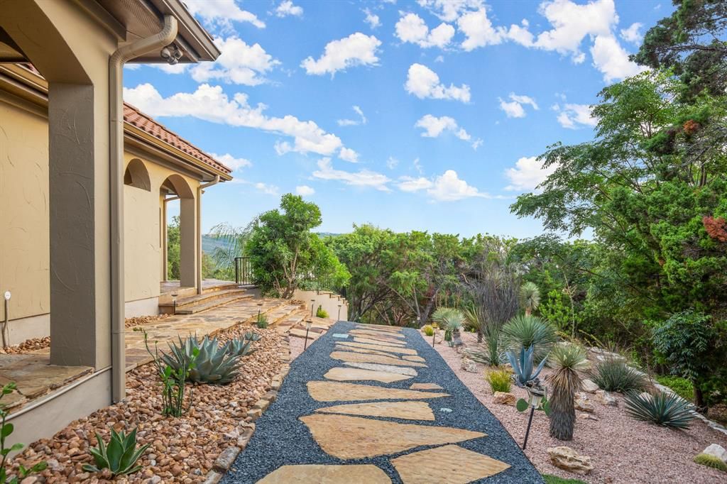 Luxurious texas hill country retreat spectacular lake travis views await in this 3. 4 million estate 35