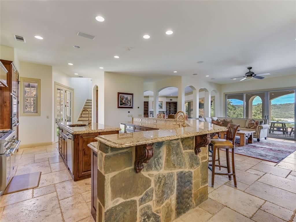 Luxurious texas hill country retreat spectacular lake travis views await in this 3. 4 million estate 8