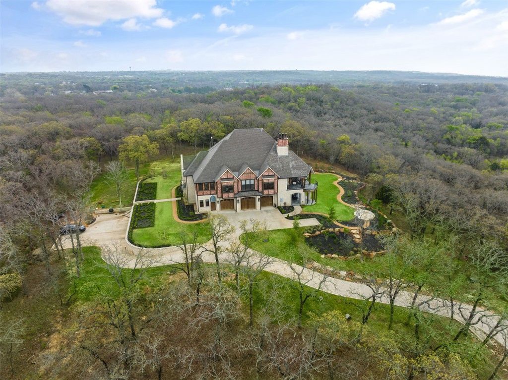 Secluded splendor luxurious retreat nestled on 34 wooded acres only an hour north of dallas offered at 5. 7 million 24