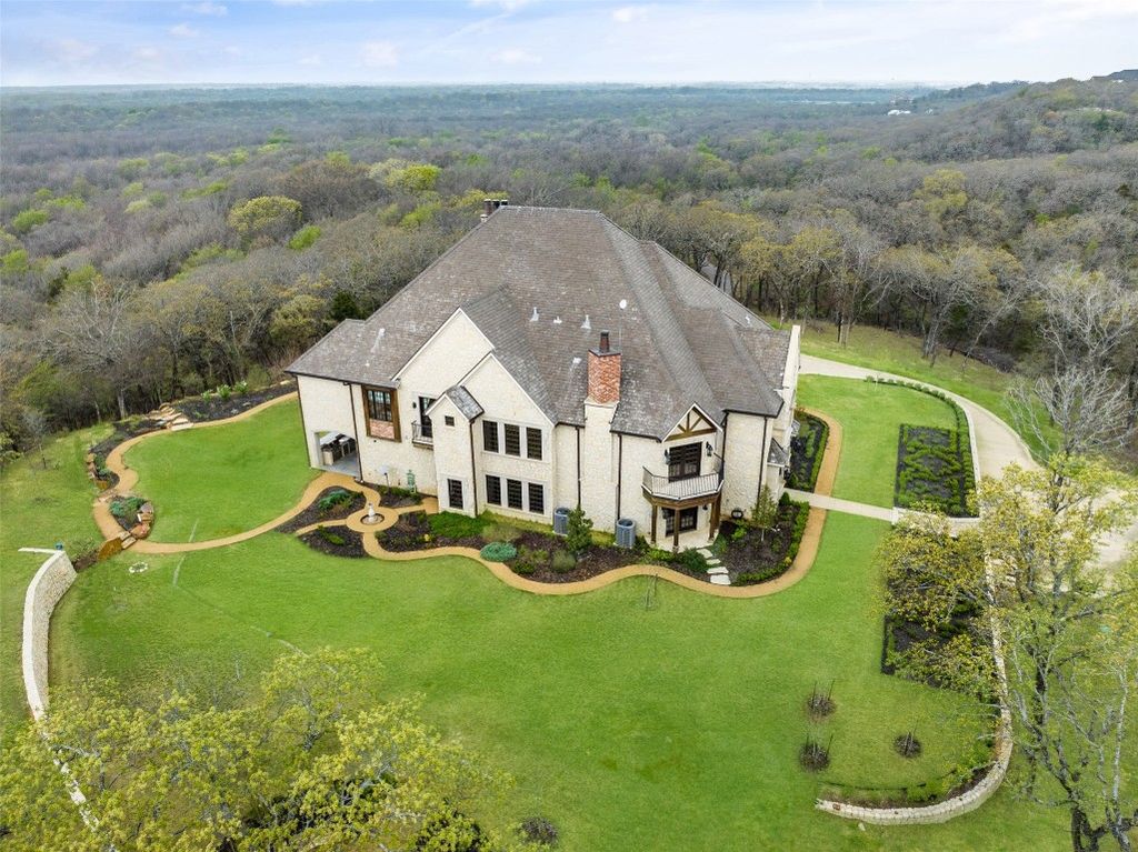 Secluded splendor luxurious retreat nestled on 34 wooded acres only an hour north of dallas offered at 5. 7 million 27