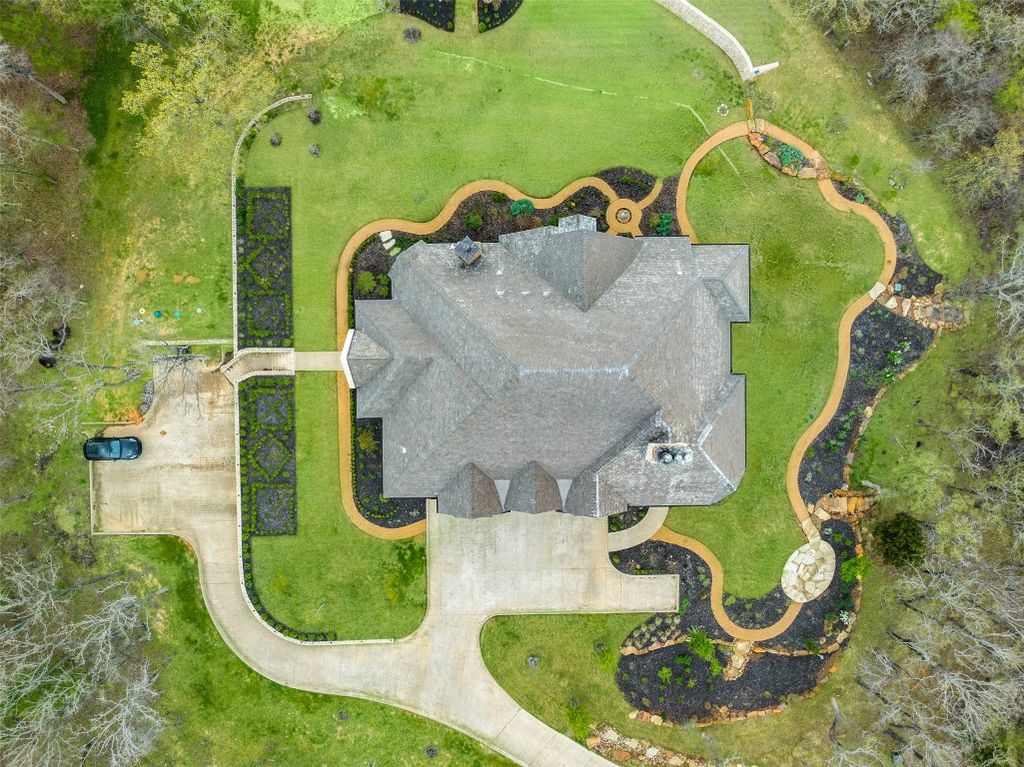 Secluded splendor luxurious retreat nestled on 34 wooded acres only an hour north of dallas offered at 5. 7 million 28