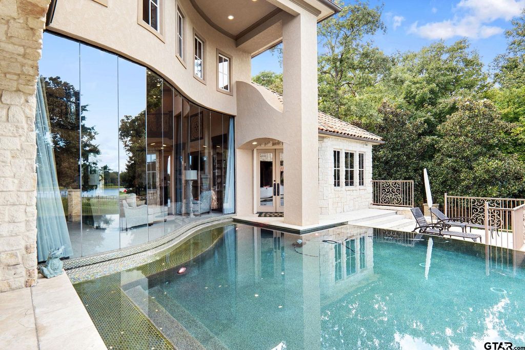 Serenity by the lake elegant home offers tranquil living at 2. 1 million 40
