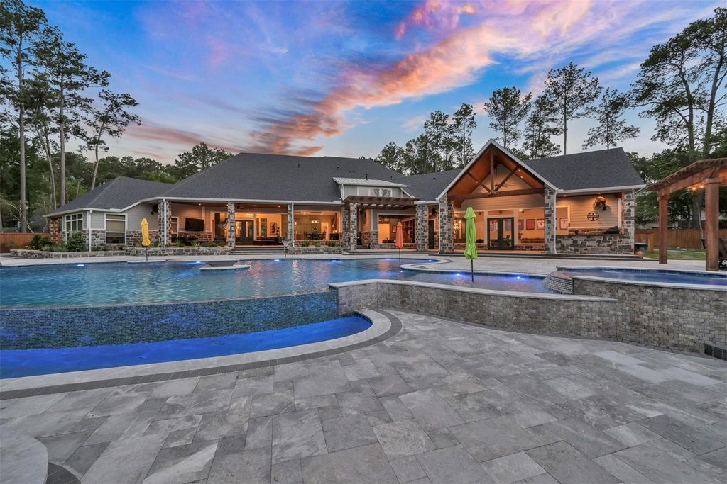 Stunning lake windcrest estate offers private resort living for 3. 385 million 36