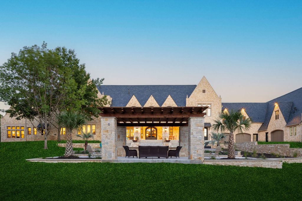 Stunning french inspired estate spanning 2 acres in the landing gated community listed for 7995000 4