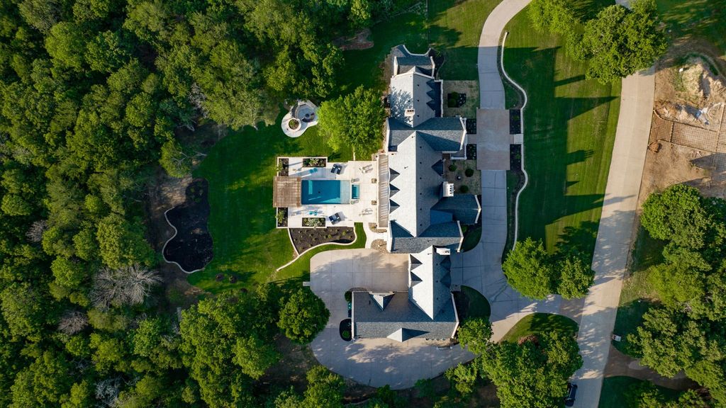 Stunning french inspired estate spanning 2 acres in the landing gated community listed for 7995000 7