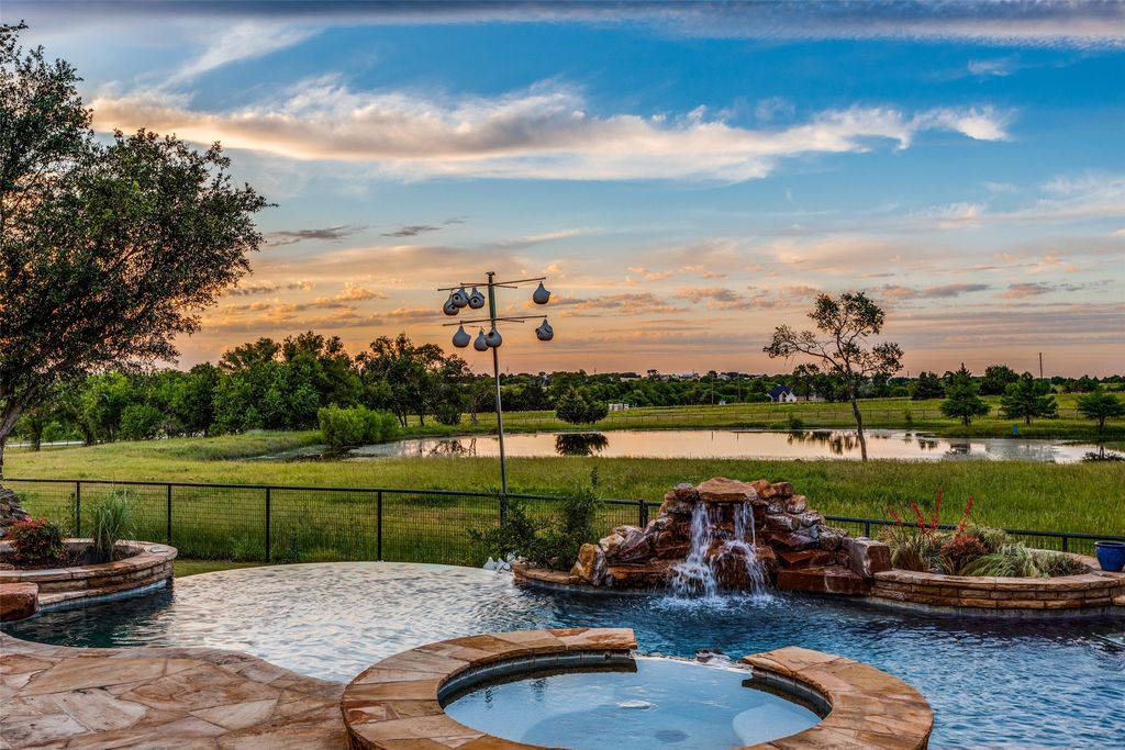 Stunning ranch retreat luxury living amidst serene pastures and pristine equestrian facilities asks for 2. 45 million 18