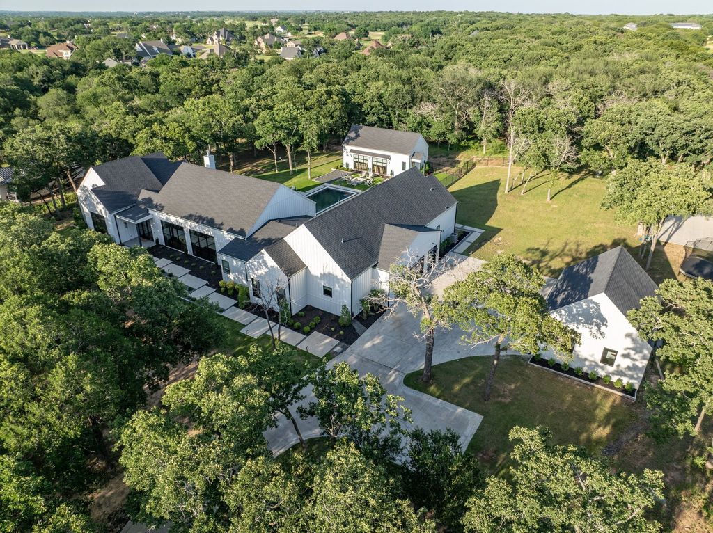 Breathtaking One-Story Estate on 9+ Acres of Gated, Ag-Exempt Wooded Grounds Listed for $4,495,000