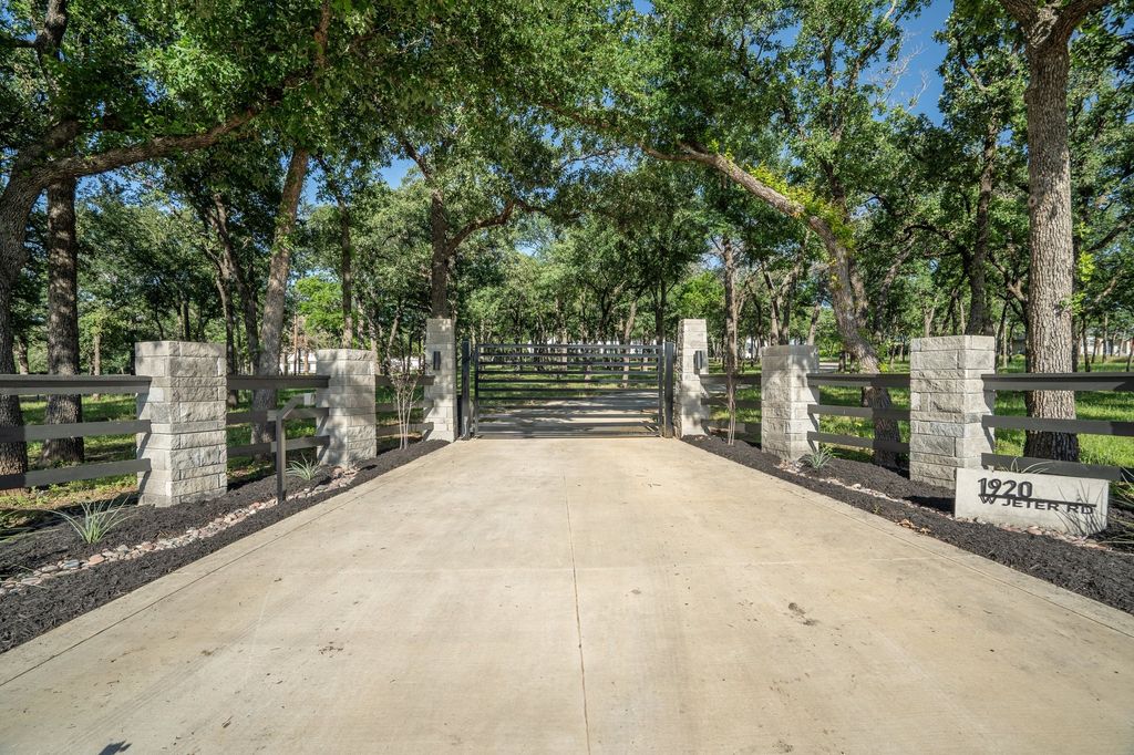 Breathtaking one story estate on 9 acres of gated ag exempt wooded grounds listed for 4495000 3
