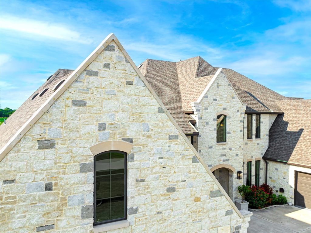 Exquisite luxury living custom stone facade estate with unmatched craftsmanship asks for 2. 2 million 2