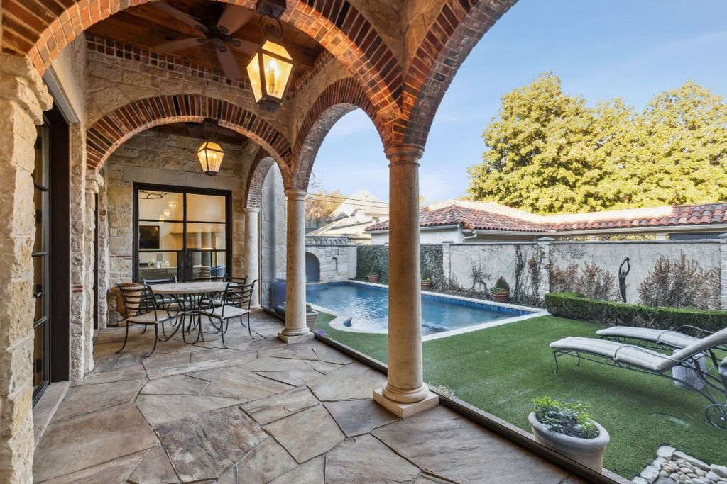Mediterranean home with tuscan influences featuring specialty touches throughout listed for 6095000 31