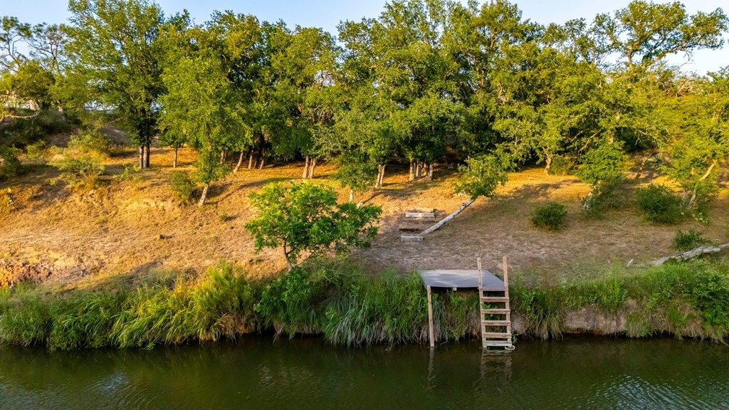 Tranquil riverside retreat 371 feet of bliss on the pedernales river for 2975000 47