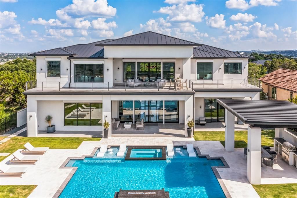 Contemporary masterpiece unrivaled waterfront living listed at 5. 4 million 3