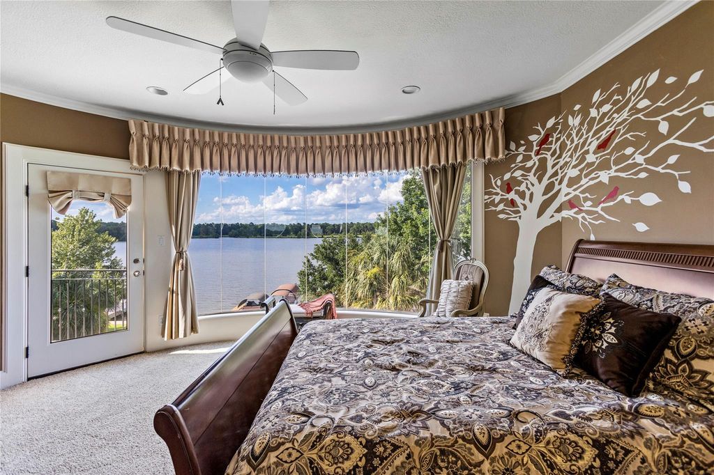 Elegant lakefront living discover this exquisite 4 story estate on lake conroe priced at 3195000 29