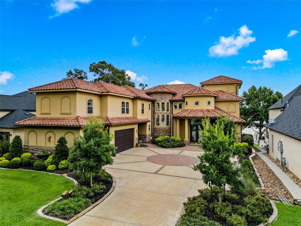 Elegant lakefront living discover this exquisite 4 story estate on lake conroe priced at 3195000 3