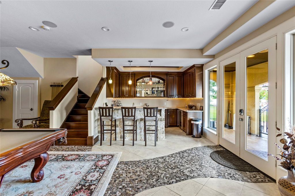 Elegant lakefront living discover this exquisite 4 story estate on lake conroe priced at 3195000 36