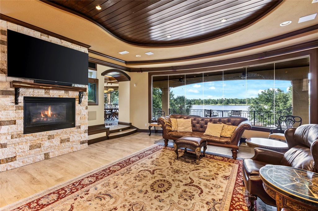 Elegant lakefront living discover this exquisite 4 story estate on lake conroe priced at 3195000 8