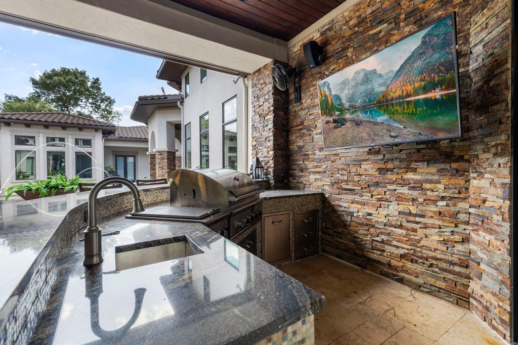 Elegant one story home with stucco stone exterior listed for 4 million 35