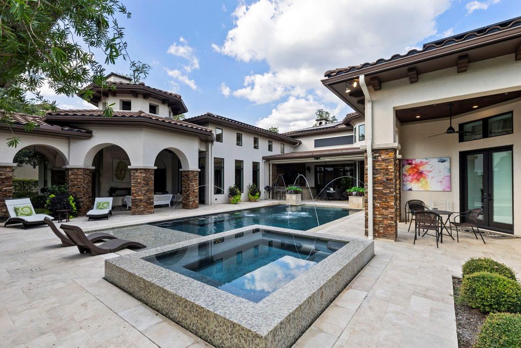 Elegant one story home with stucco stone exterior listed for 4 million 38