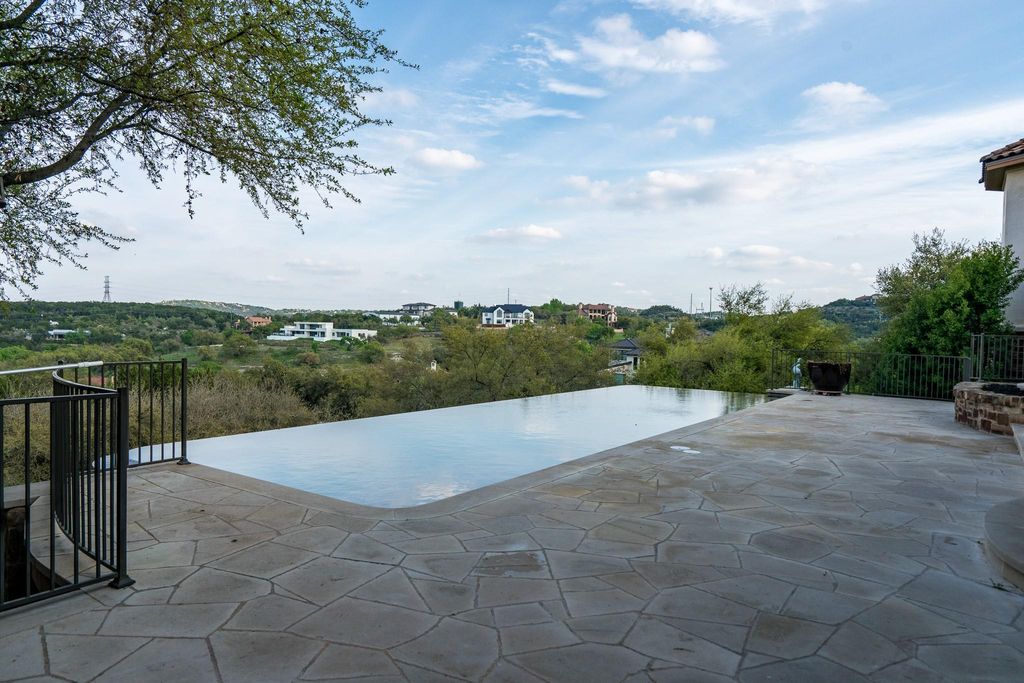 Stunning hill country inspired stadler custom home overlooking scenic hillside hits market at 3. 6 million 43