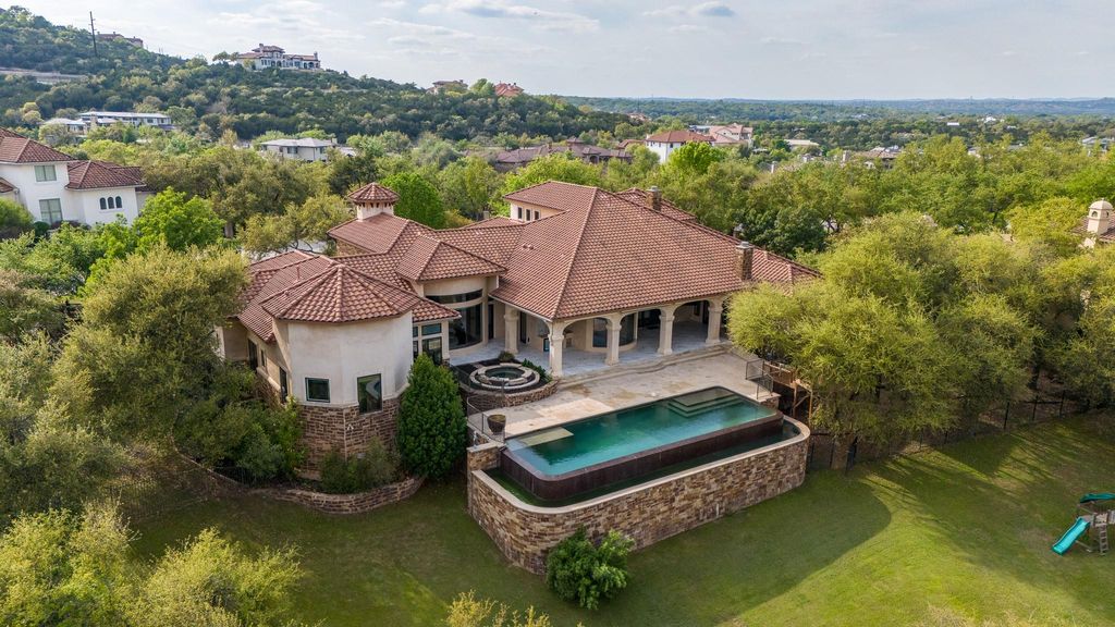 Stunning hill country inspired stadler custom home overlooking scenic hillside hits market at 3. 6 million 48