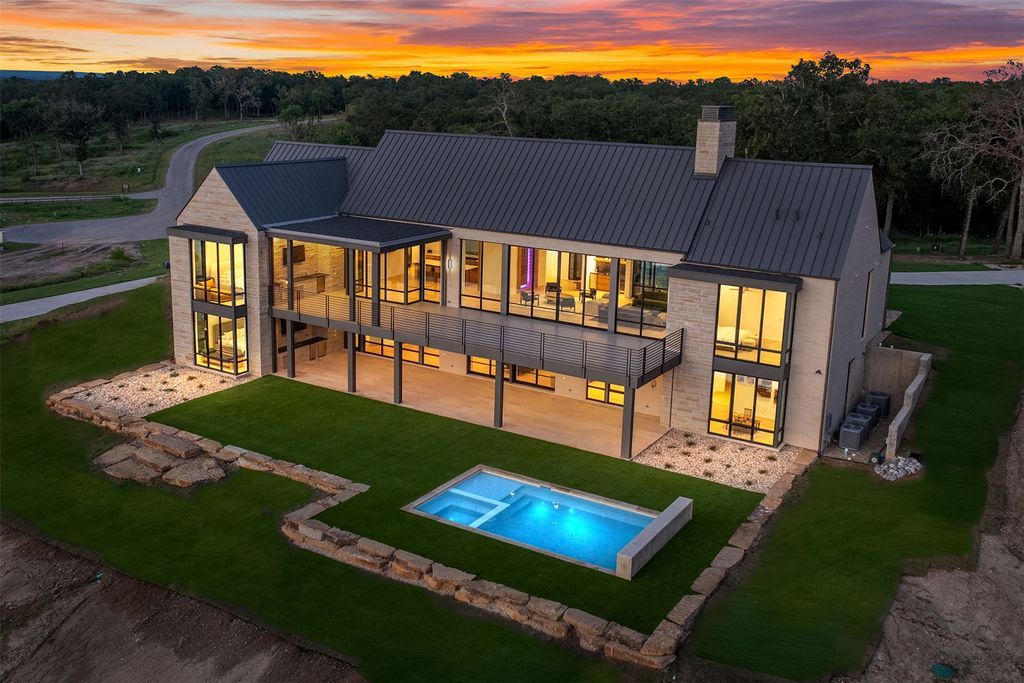 Bespoke lake retreat nestled in the bluffs at cedar creek lake priced at 5999000 2