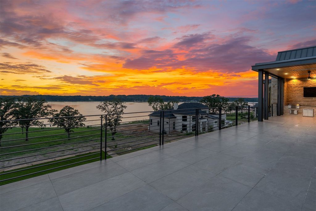 Bespoke lake retreat nestled in the bluffs at cedar creek lake priced at 5999000 40