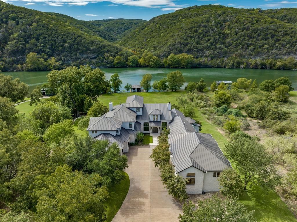 Modern luxury on lake austin remarkable home in prestigious enclave asks for 12. 75 million 1